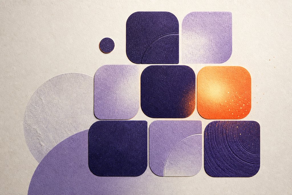 Abstract artwork of bold letter tiles with an ember glow
